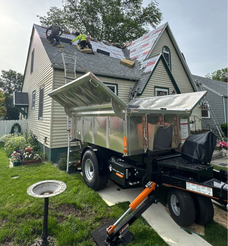 equipter Dakota Storm Roofing crew using Equipter technology for debris-free residential roof replacement in Pierre, South Dakota