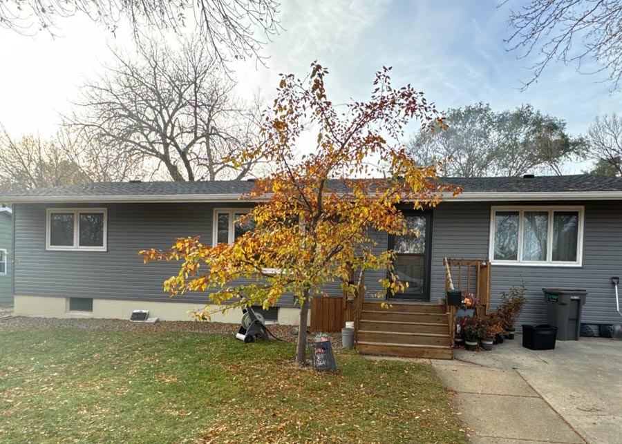 new-gray-siding A modern, professional siding installation in a neutral gray tone, perfectly suited for long-lasting exterior home protection